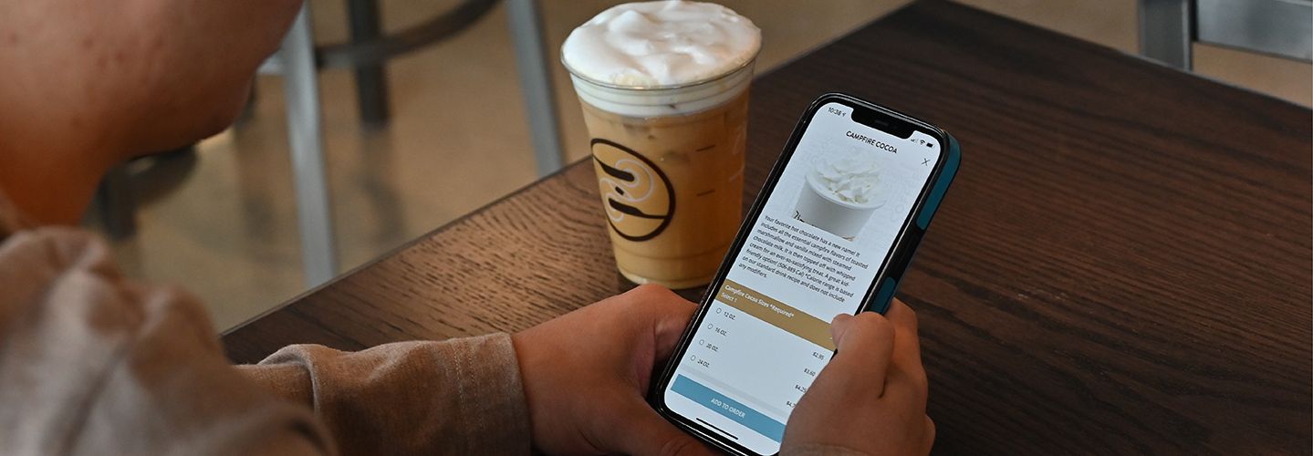 Person uses the Ziggi's mobile app to easily order a delicious drink from Ziggi's Coffee.