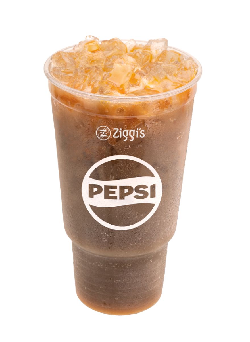 Iced OMG Dirty Soda with soda, cream, and flavor over ice in a Ziggi’s Coffee cup.