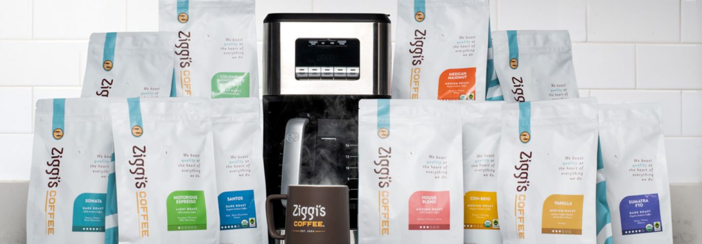 Coffee maker, coffee bags on counter, text on right 'Free shipping 3 or more bags of coffee'
