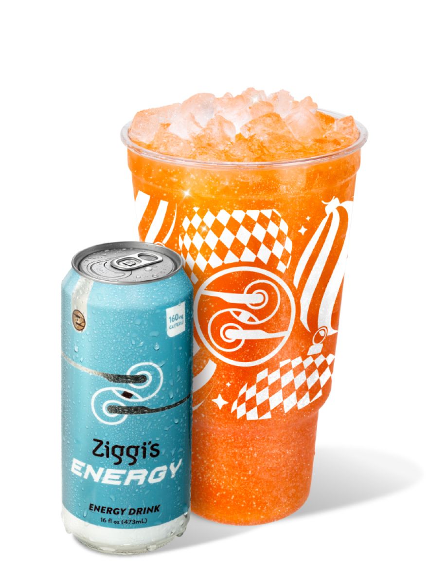 Sparkle & Spice Energy Infusion made with Ziggi’s Energy, featuring orange, pomegranate, cinnamon, and edible glitter.